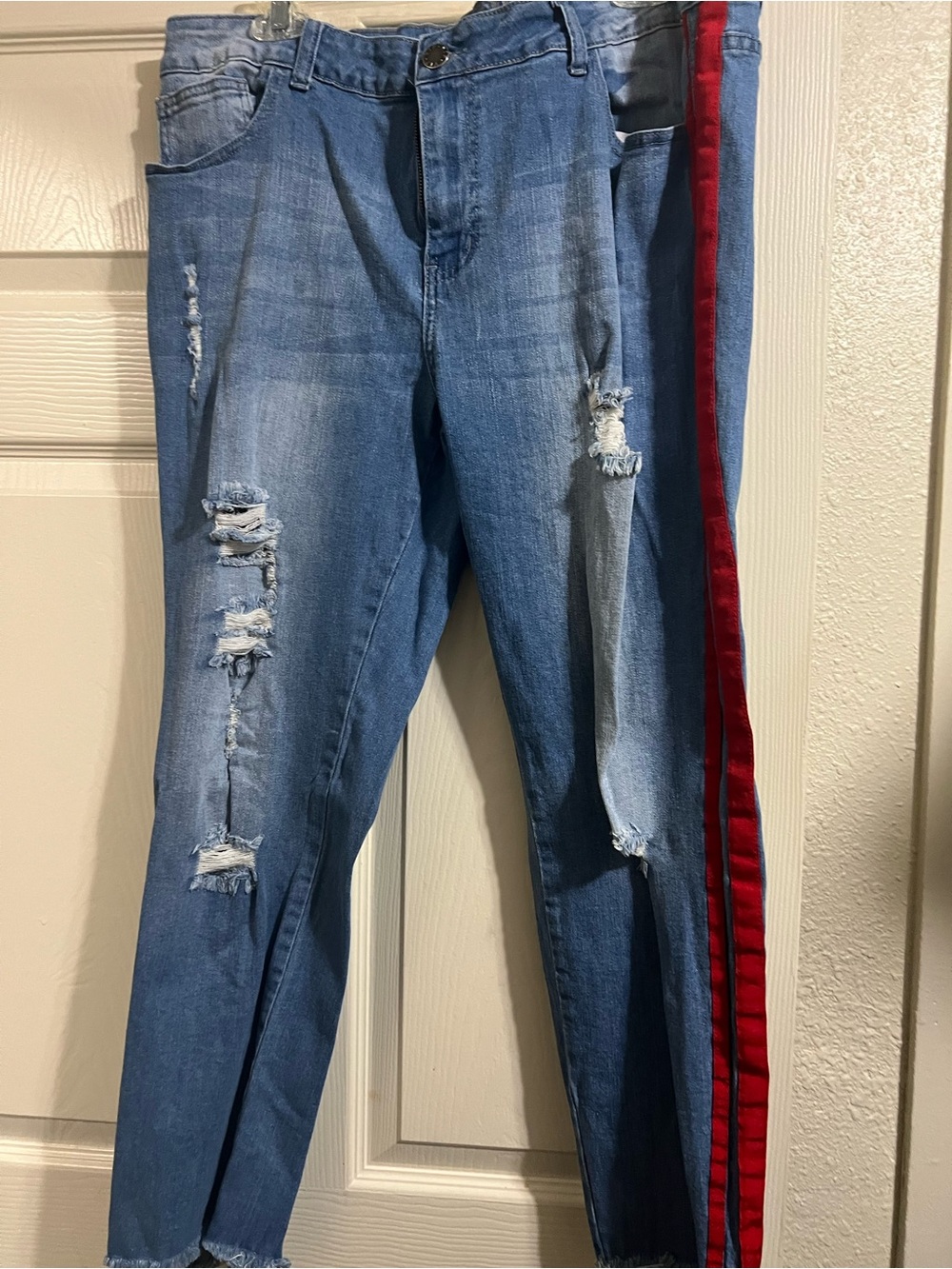 Distressed Light Blue Jeans with Red Side Stripe